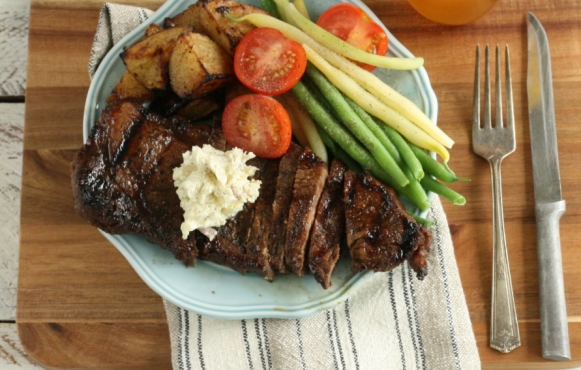 Brown Sugar Whiskey Steak with Roasted Garlic Blue Cheese Butter